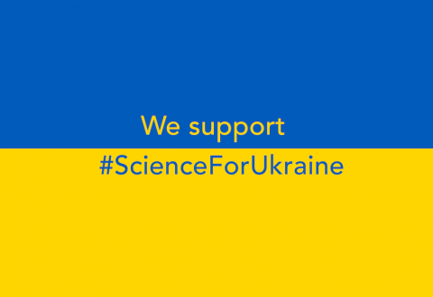 Ukrainan lippu, jossa teksti We support #ScienceForUkraine